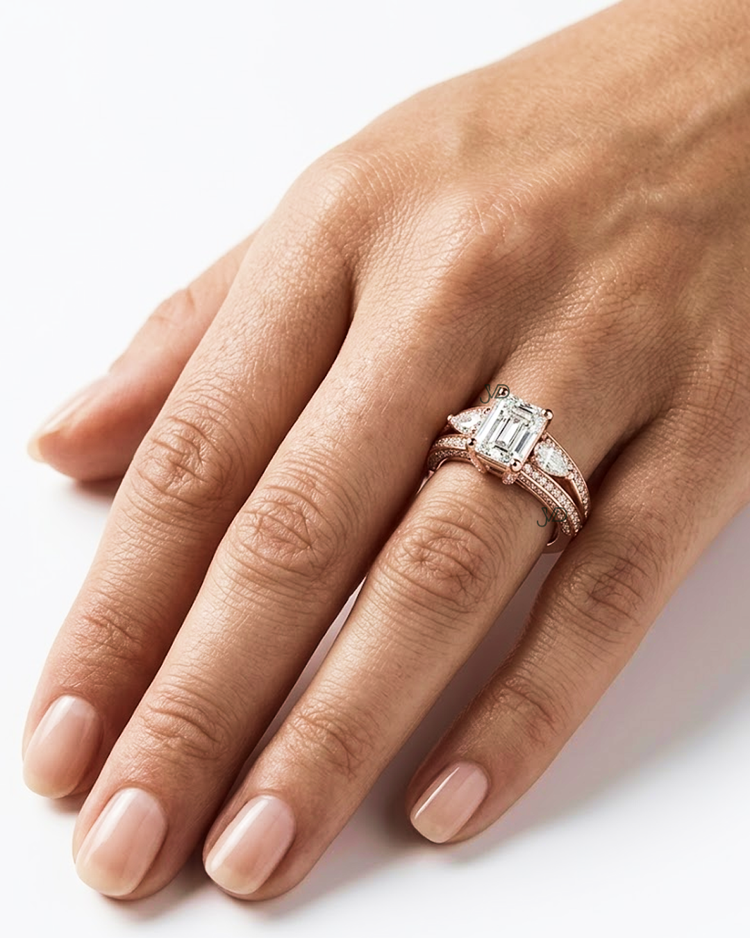 14K Rose Gold Emerald Cut Diamond Engagement Ring with Pear Side Stones | JVDSON thumbnail